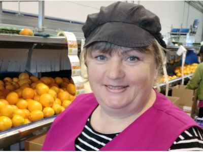 Natalia: Le triage et l'emballage des agrumes